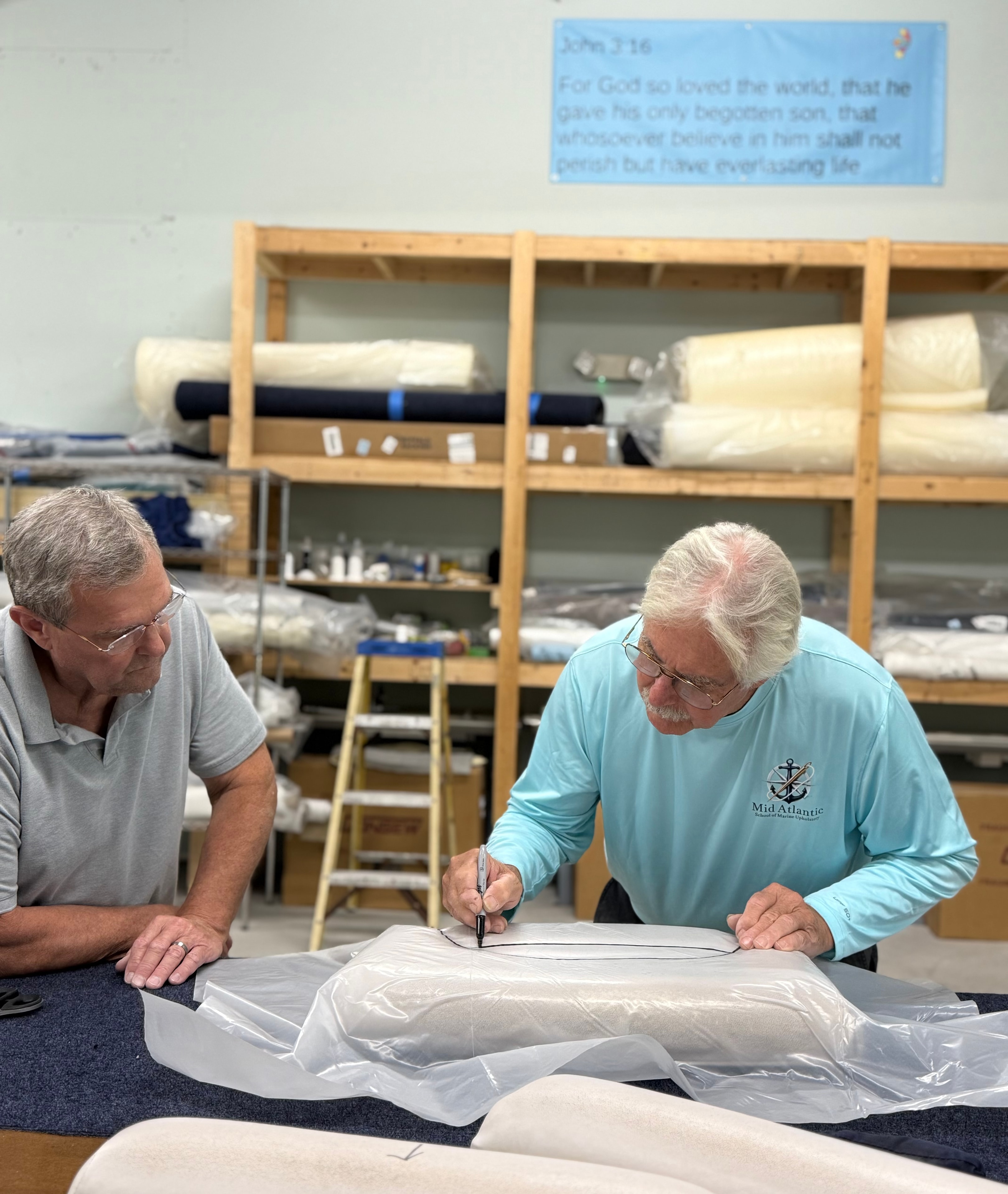 Students marking cushion pattern at Mid Atlantic School of Marine Upholstery